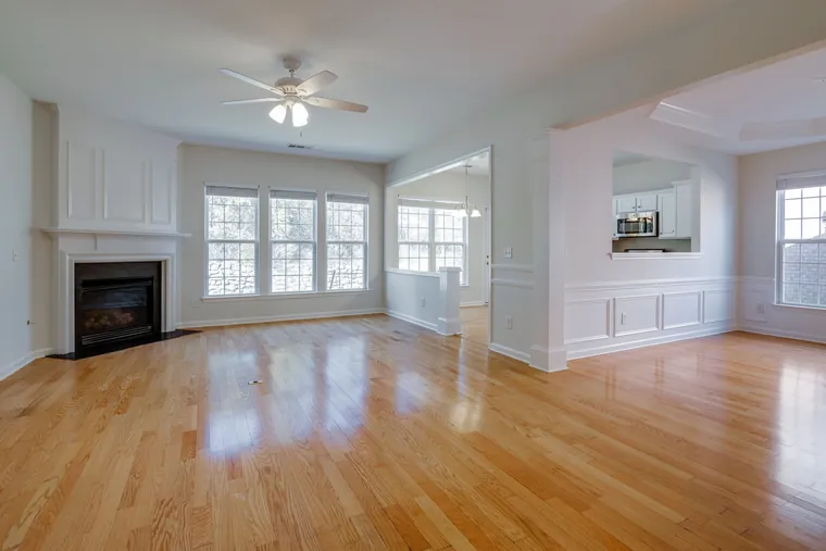 Great room with gas fireplace and hardwood floors